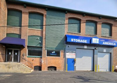 Storage America facility in Pawtucket, RI, showcasing affordable self-storage units and parking for boats and RVs.